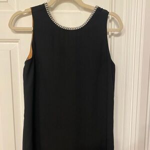 Black shift dress with jeweled neck detail